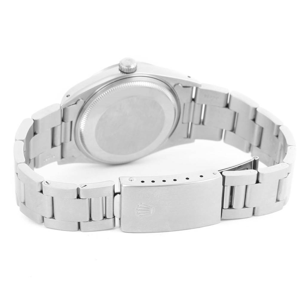 This image shows the back view of a Rolex Air-King 14000 Men's Stainless Steel Blue Dial 14000 Men's Stainless Steel Blue Dial watch, highlighting its case back, bracelet, and clasp.