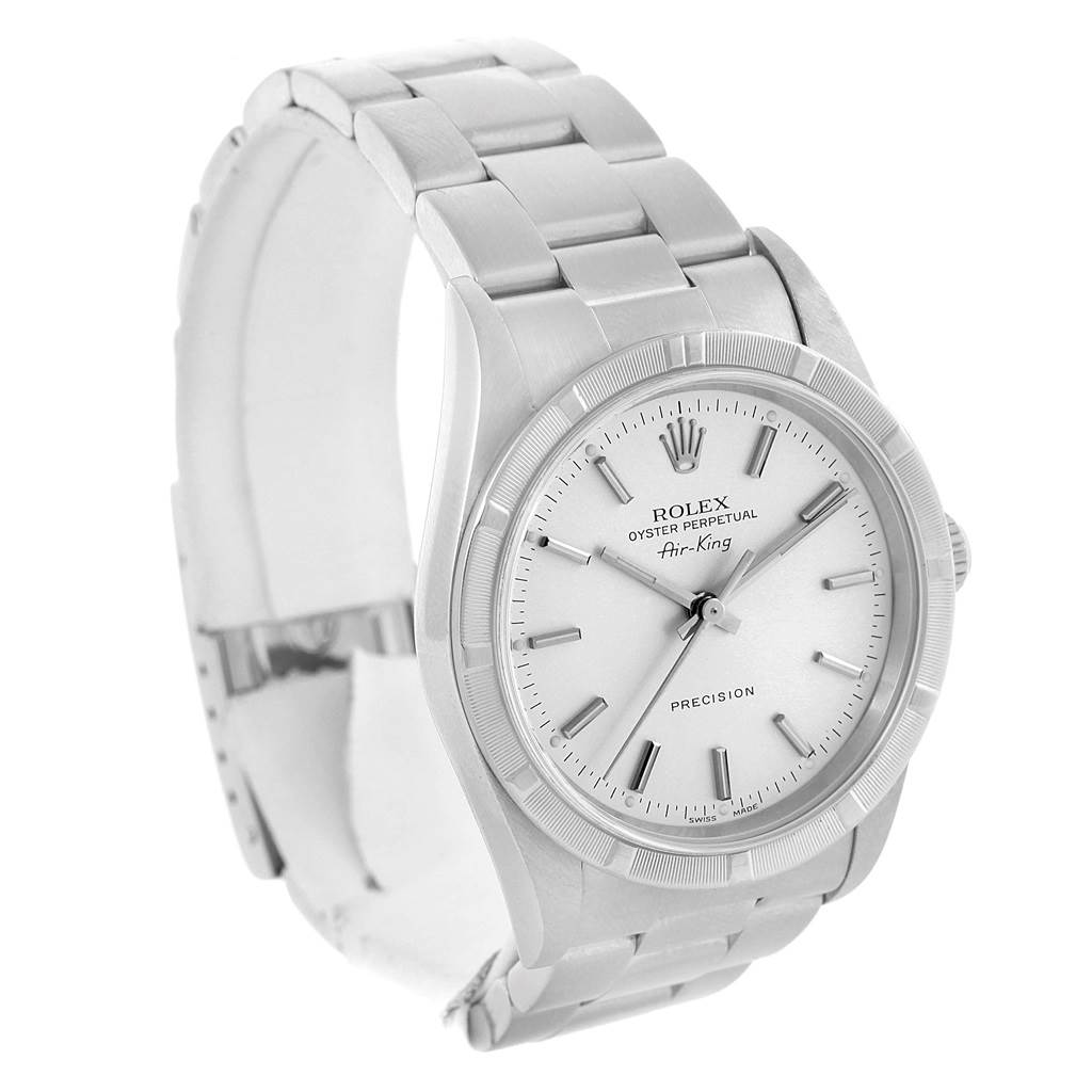 This image shows a side angle view of a Rolex Air-King 14010 Men's Stainless Steel Silver Dial 14010 Men's Stainless Steel Silver Dial watch, highlighting its face, bezel, and bracelet.