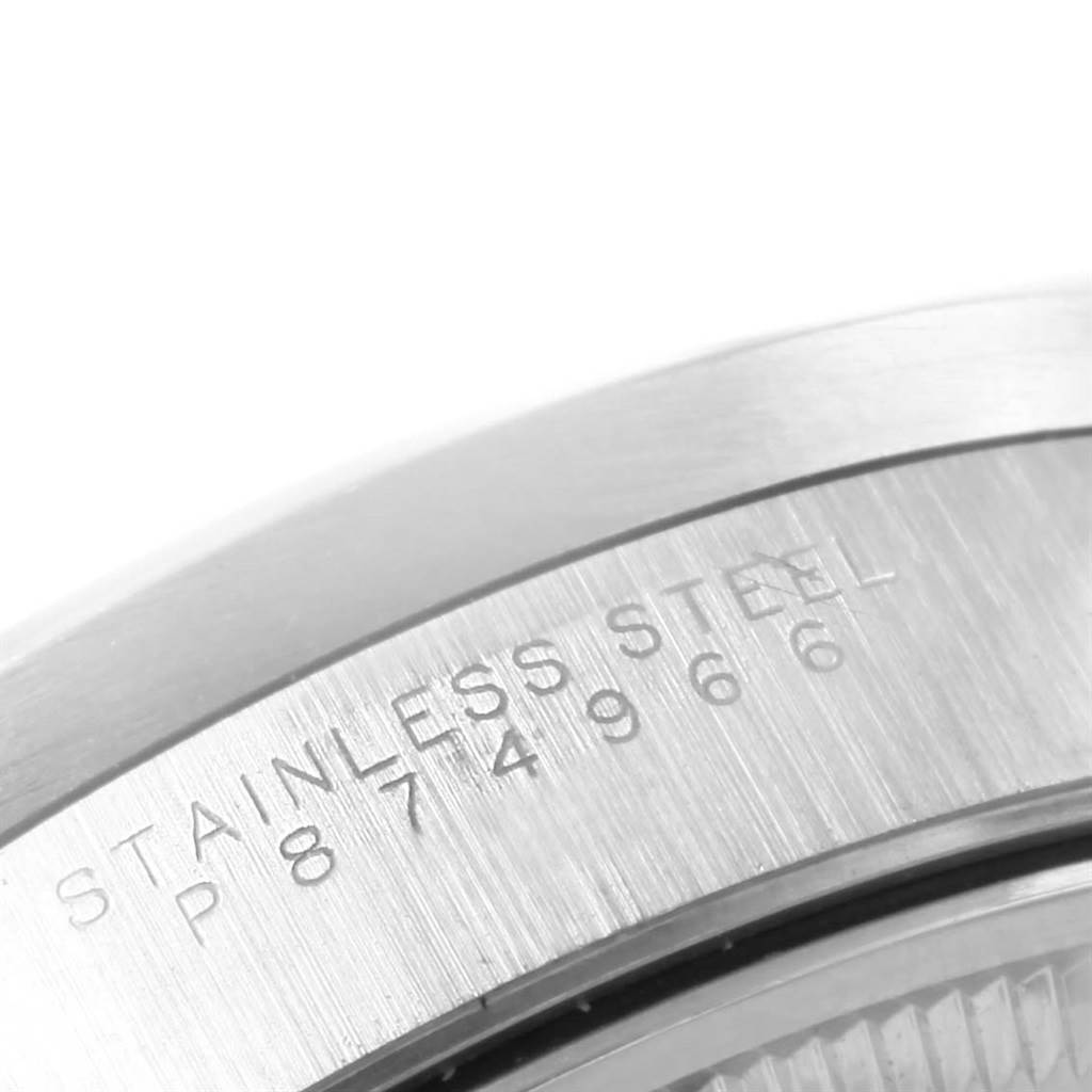 This is a close-up shot of the stainless steel case back of a Rolex Air-King 14010 Men's Stainless Steel Silver Dial 14010 Men's Stainless Steel Silver Dial watch, showing part of the serial number.