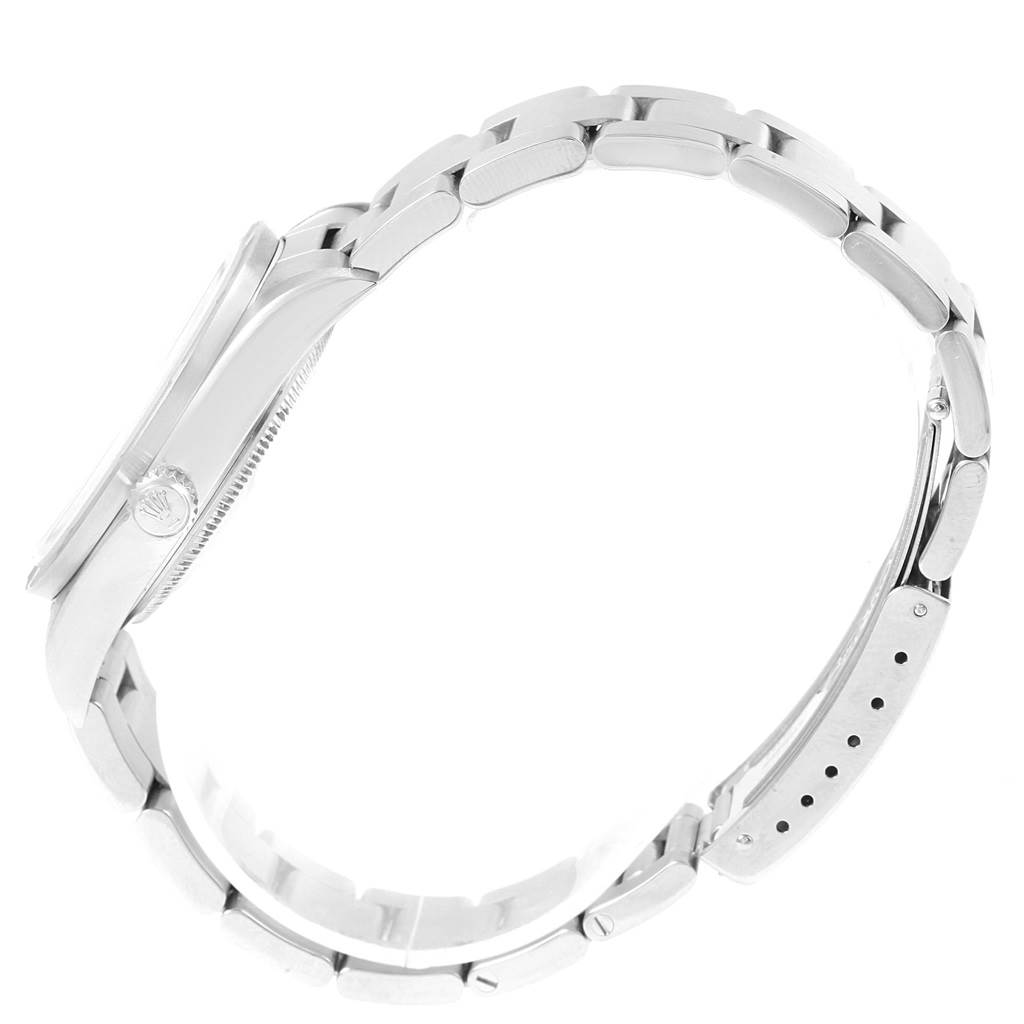 The Rolex Air-King 14010 Men's Stainless Steel White Dial 14010 Men's Stainless Steel White Dial watch is shown from a side profile, highlighting its case, crown, and bracelet.