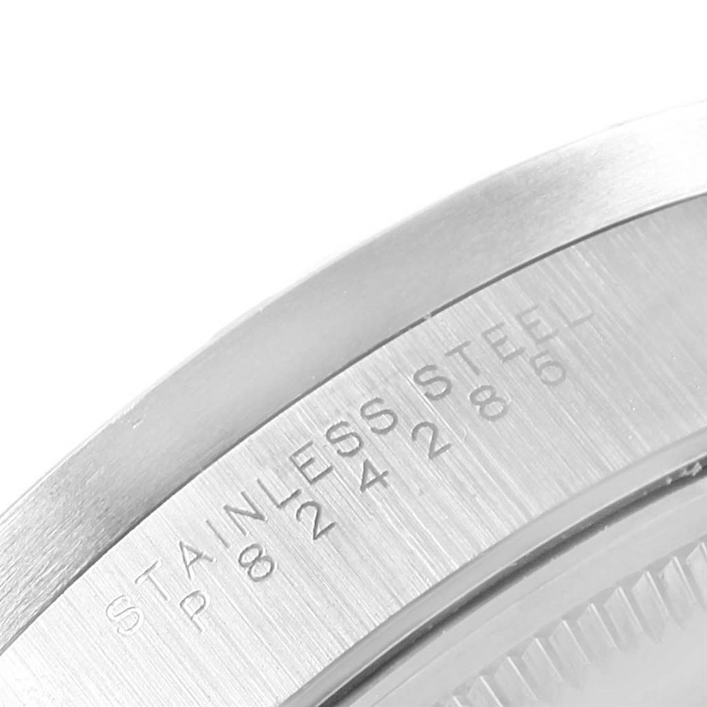 This image shows a close-up of the case back of the Rolex Air-King 14010 Men's Stainless Steel White Dial 14010 Men's Stainless Steel White Dial, highlighting the stainless steel engraving.