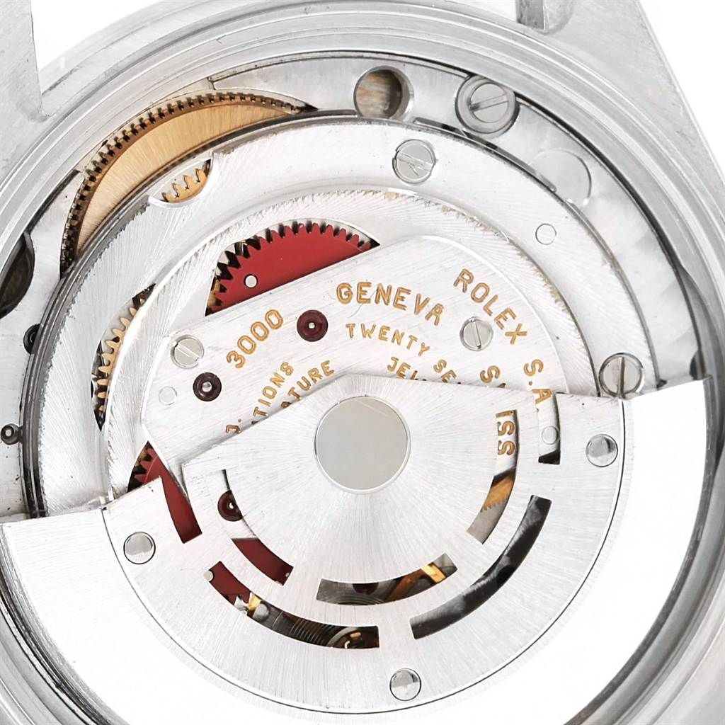 This image shows the internal mechanical movement of the Rolex Air-King 14010 Men's Stainless Steel Blue Dial 14010 Men's Stainless Steel Blue Dial watch, specifically its gears and rotor mechanism, viewed from a close-up angle.