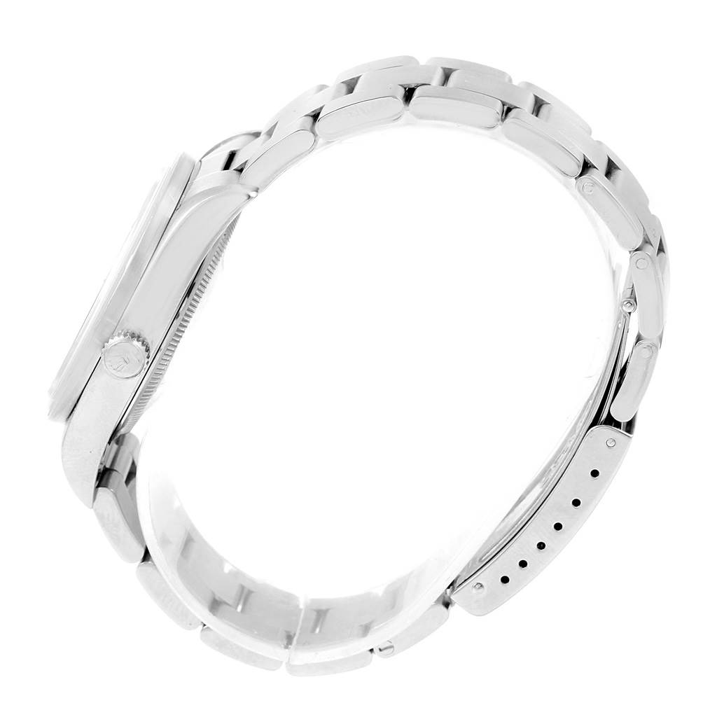 The image shows a side view of a Rolex Air-King 14010 Men's Stainless Steel Blue Dial 14010 Men's Stainless Steel Blue Dial watch, highlighting the case, crown, and bracelet.