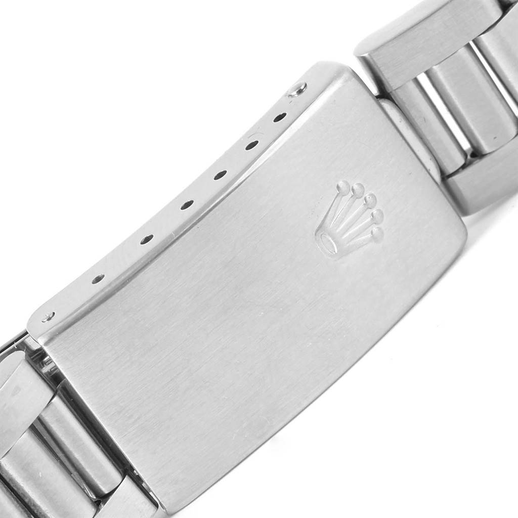 The image shows a top-down view of the Rolex Air-King 14000 Men's Stainless Steel Black Dial 14000 Men's Stainless Steel Black Dial watch clasp with the Rolex crown logo engraved on it.