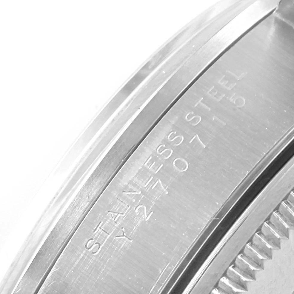 This image shows a close-up of the case back and edge details of the Rolex Air-King 14000 Men's Stainless Steel Black Dial 14000 Men's Stainless Steel Black Dial watch, highlighting its stainless steel material and engravings.