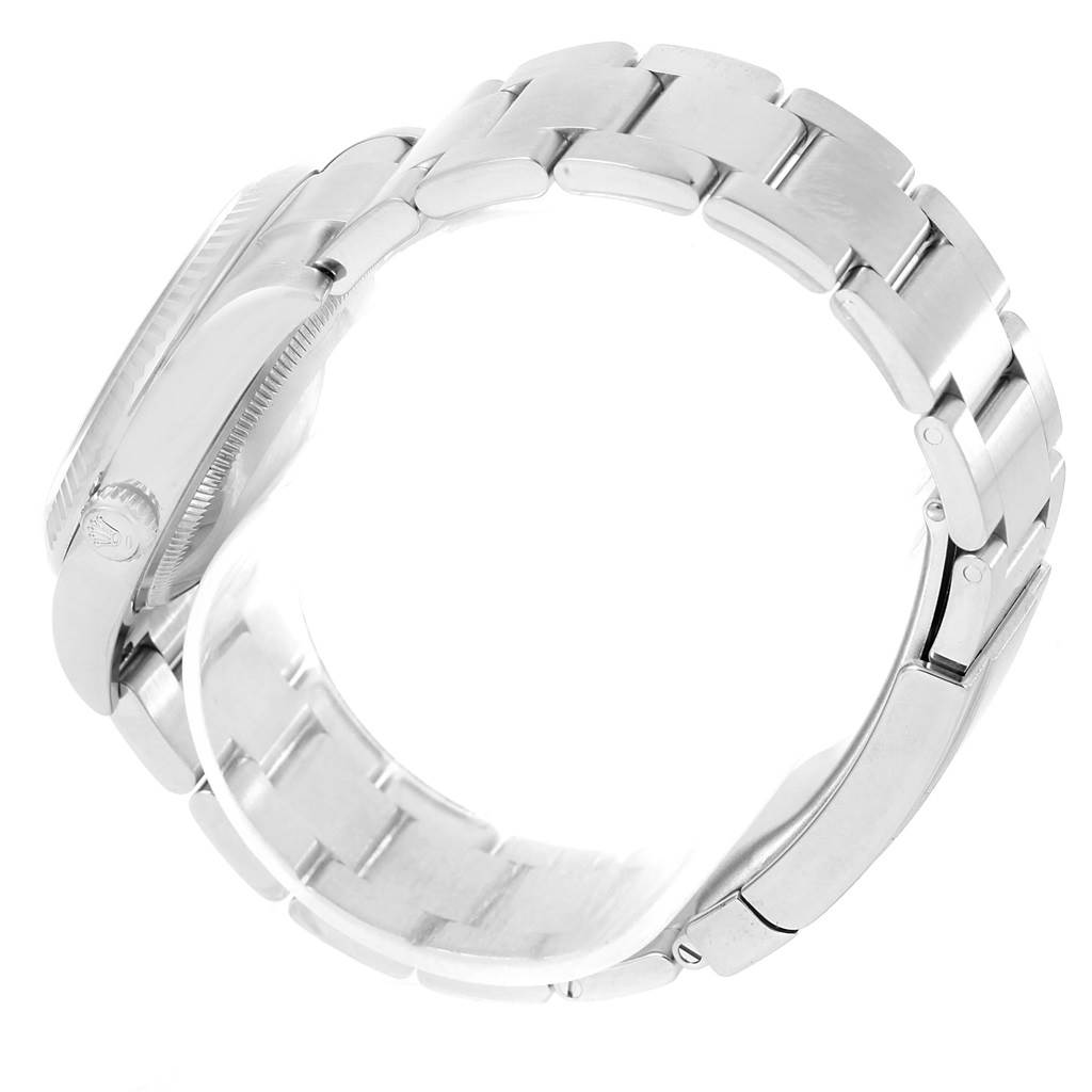 The image shows the side view and clasp of the Rolex Air-King 114234 Men's Stainless Steel Blue Dial 114234 Men's Stainless Steel Blue Dial watch, showcasing its metal bracelet and bezel.