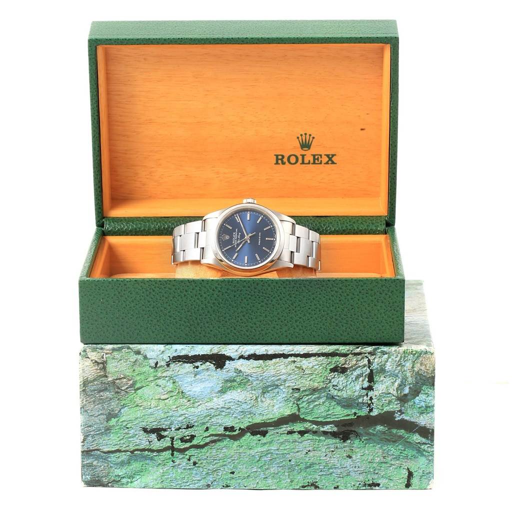 The image shows a Rolex Air-King 14000 Men's Stainless Steel Blue Dial 14000 Men's Stainless Steel Blue Dial watch in its open green and wooden box, viewed from the front.
