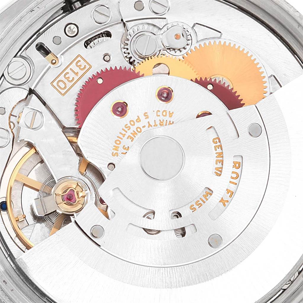 The image shows the internal mechanism and movement of a Rolex Air-King 114200 Stainless Steel Silver Dial 114200 Stainless Steel Silver Dial watch, highlighting its gears and rotor.