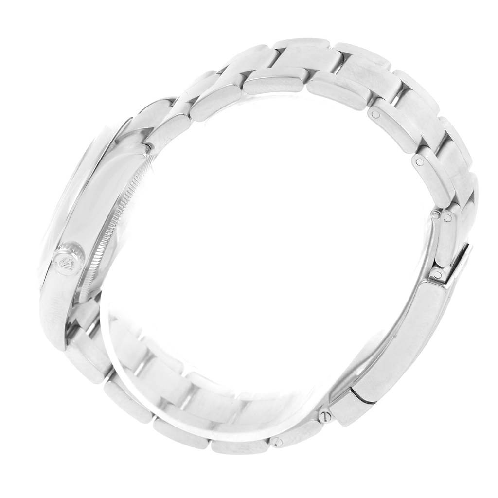 The image shows a side view of a Rolex Air-King 114200 Men's Stainless Steel White Dial 114200 Men's Stainless Steel White Dial watch, focusing on the case and metal bracelet.