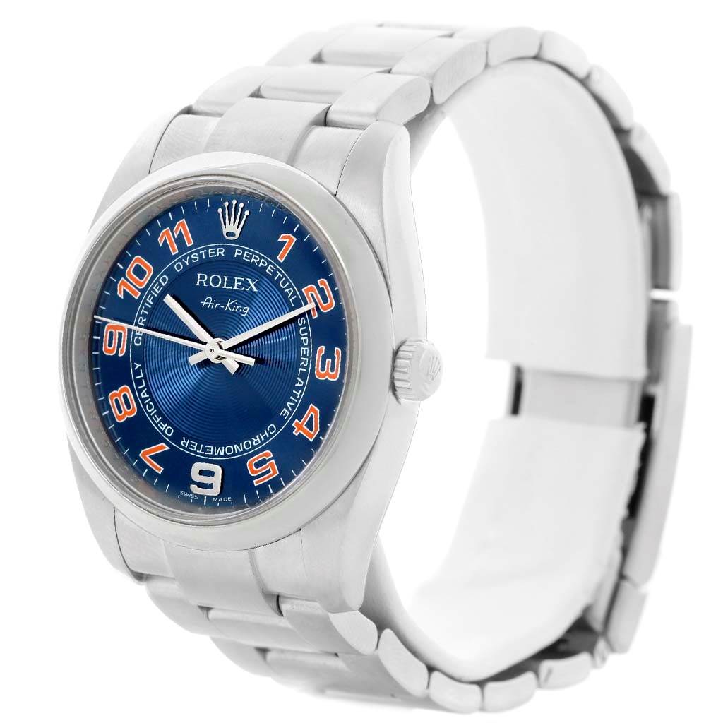 The Rolex Air-King 114200 Stainless Steel Blue Dial 114200 Stainless Steel Blue Dial watch is shown at a three-quarter angle, displaying its blue dial, stainless steel case, and bracelet.