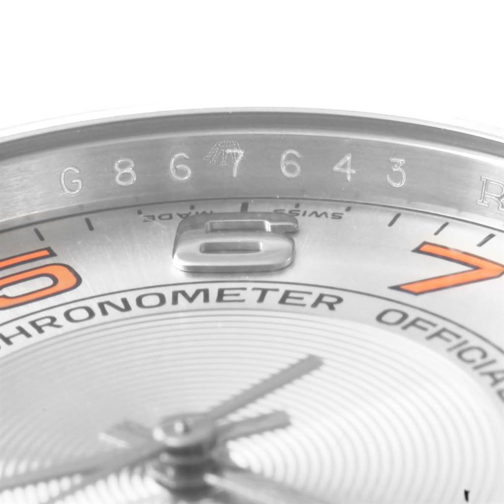 The image shows a close-up of the dial and serial number of a Rolex Air-King 114200 Men's Stainless Steel Silver Dial 114200 Men's Stainless Steel Silver Dial watch.