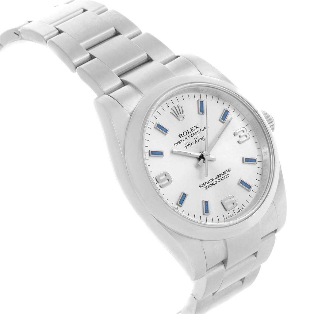 The Rolex Air-King 114200 Men's Stainless Steel Silver Dial 114200 Men's Stainless Steel Silver Dial watch is shown at a slight angle, highlighting the face, bezel, crown, and part of the bracelet.