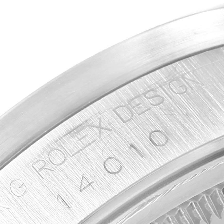 The image shows a close-up of the case back engraving on a Rolex Air-King 14010 Men's Stainless Steel White Dial 14010 Men's Stainless Steel White Dial watch.