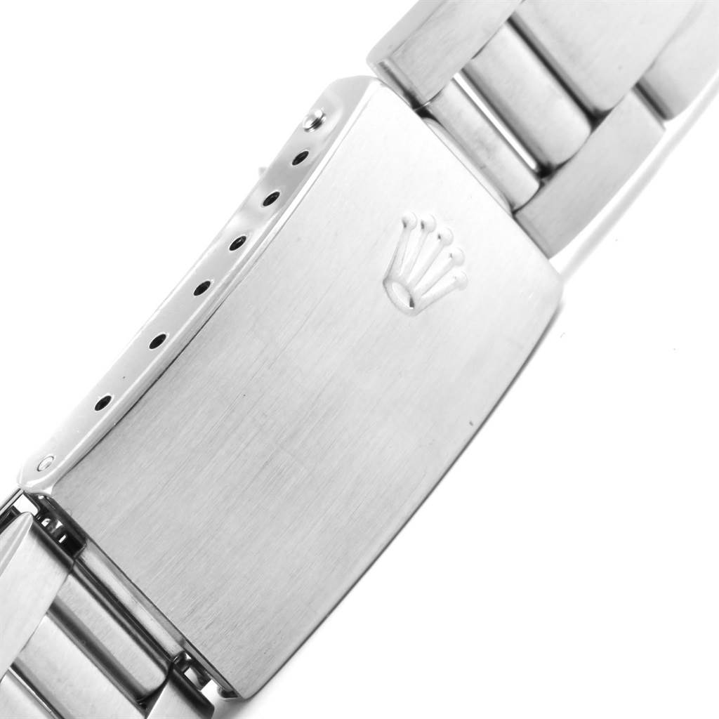 The image shows a close-up of the clasp and part of the bracelet of a Rolex Air-King 14010 Men's Stainless Steel White Dial 14010 Men's Stainless Steel White Dial watch.