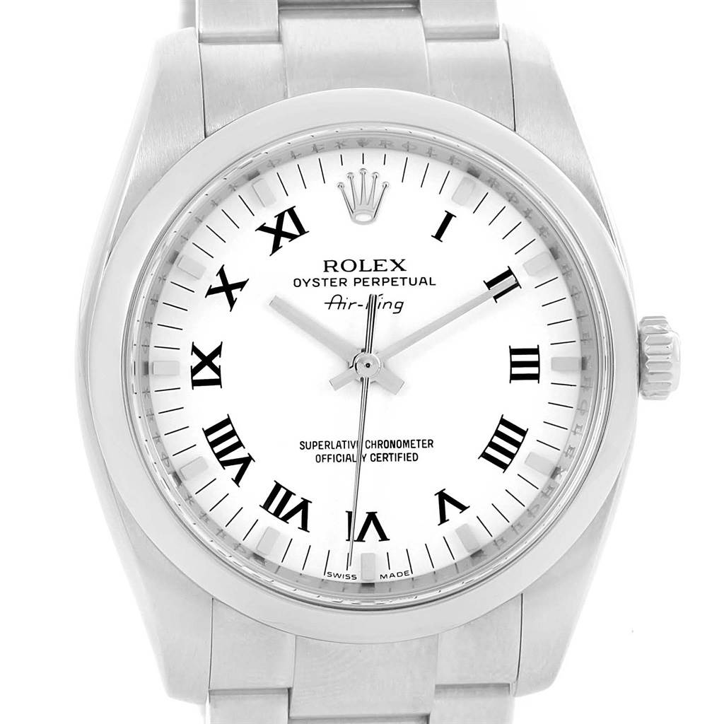 The Rolex Air-King 114200 Men's Stainless Steel White Dial 114200 Men's Stainless Steel White Dial watch is shown from the front angle, displaying its bezel, crown, dial with Roman numerals, and part of the bracelet.