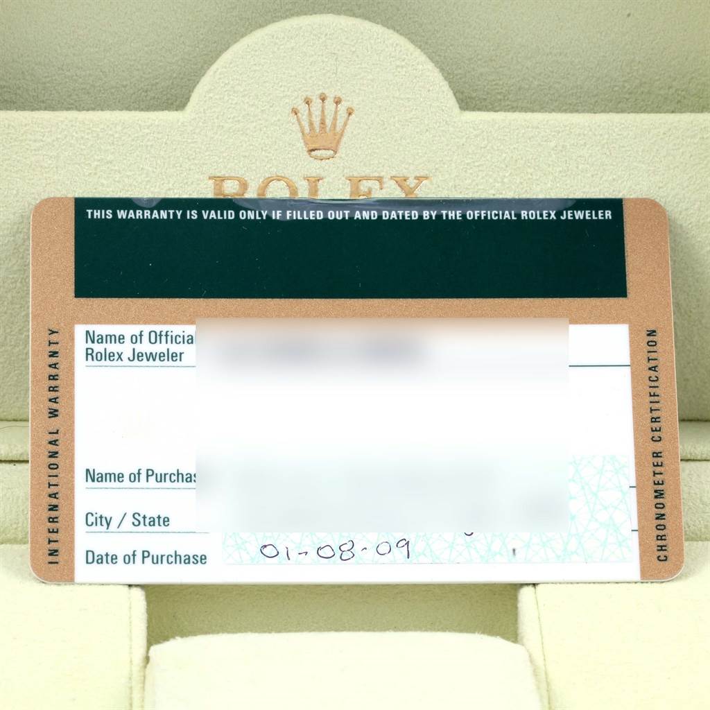 The image shows the international warranty card for a Rolex Air-King 114200 Men's Stainless Steel White Dial 114200 Men's Stainless Steel White Dial watch inside its branded case.