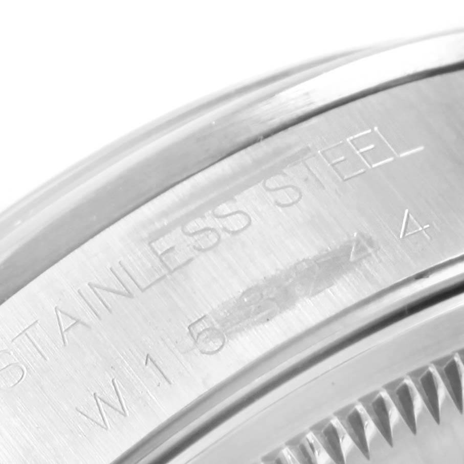 This image shows a close-up angle of the stainless steel casing and the fluted bezel of the Rolex Air-King 14000 Stainless Steel Blue Dial 14000 Stainless Steel Blue Dial watch.