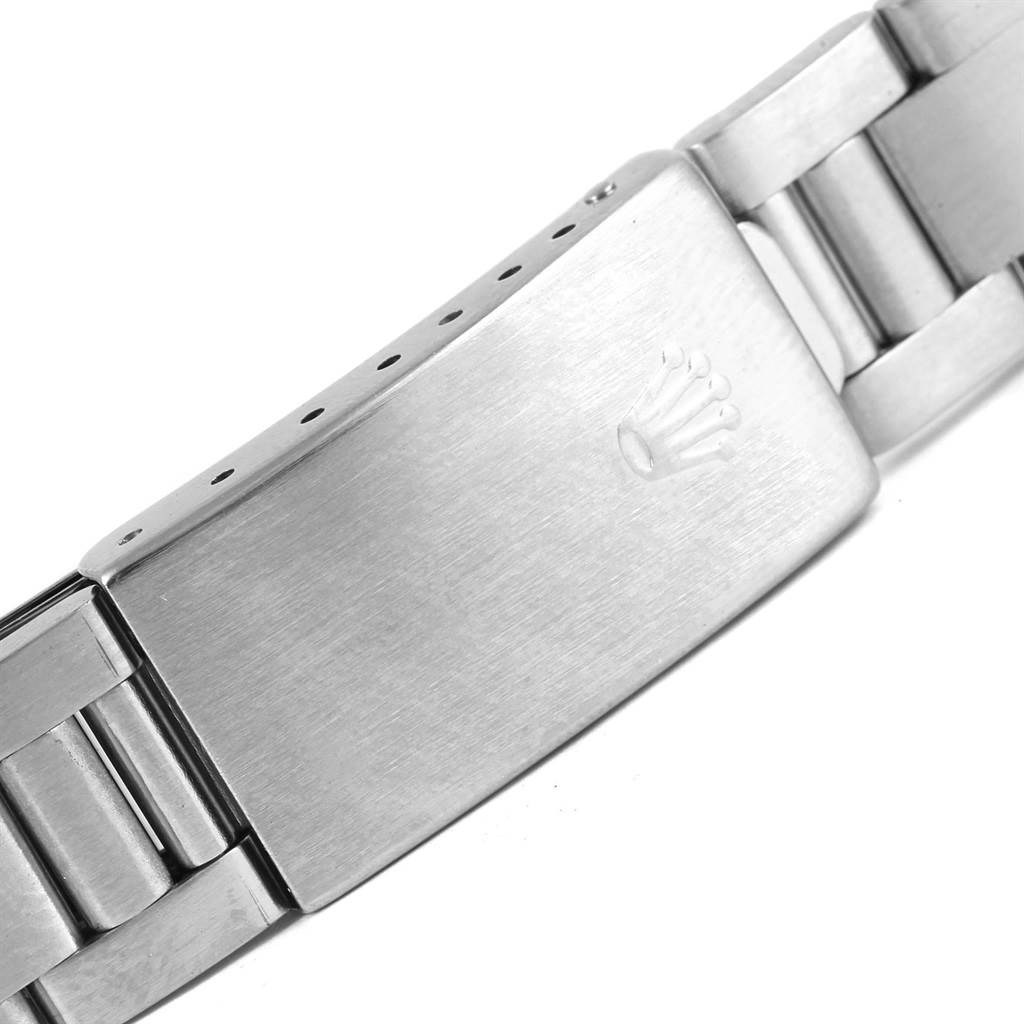 This image shows the clasp and part of the metal bracelet of a Rolex Air-King 14000 Stainless Steel Pink Dial 14000 Stainless Steel Pink Dial watch.