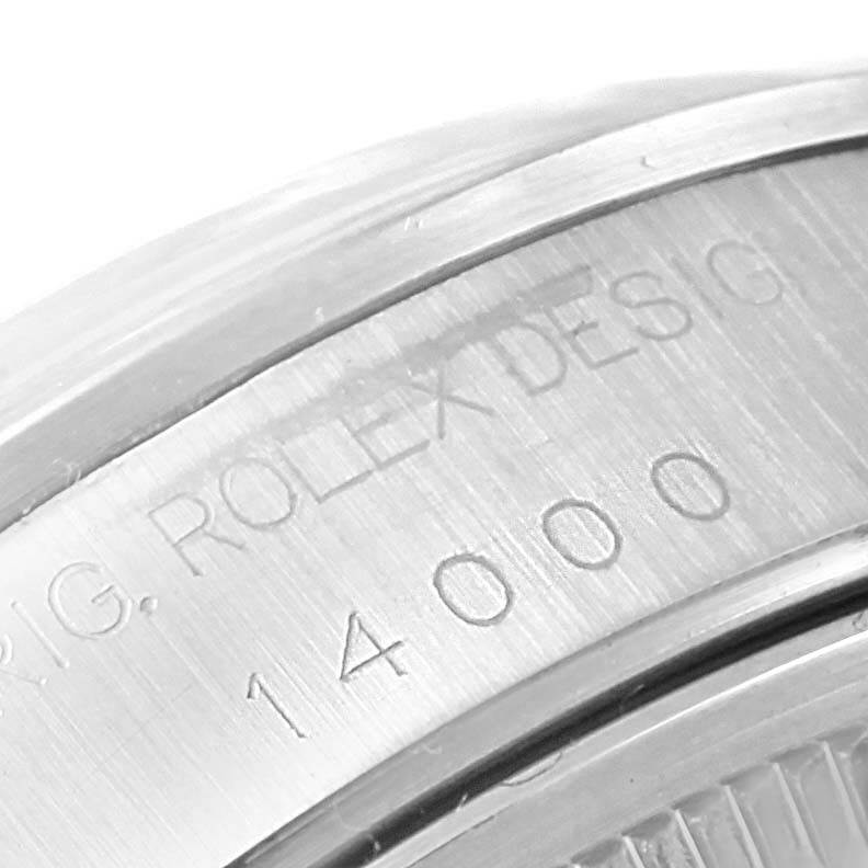 This close-up image shows the engraved details on the back or side of a Rolex Air-King 14000 Stainless Steel Pink Dial 14000 Stainless Steel Pink Dial watch.