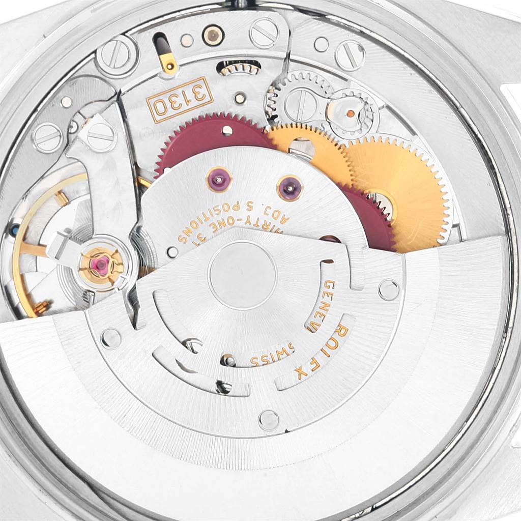 This image shows the internal mechanism of a Rolex Air-King 14010 Men's Stainless Steel Pink Dial 14010 Men's Stainless Steel Pink Dial watch, displaying its gears and intricate components.