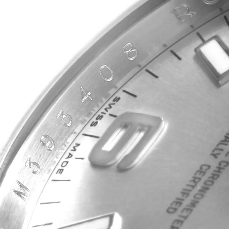 The image shows a close-up of the dial, indices, and a portion of the bezel of a Rolex Air-King 114210 Stainless Steel Silver Dial 114210 Stainless Steel Silver Dial watch.