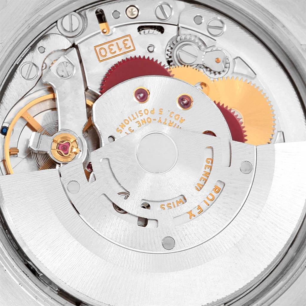 This image shows a close-up view of the movement and internal components of the Rolex Air-King 114210 Stainless Steel Silver Dial 114210 Stainless Steel Silver Dial watch.