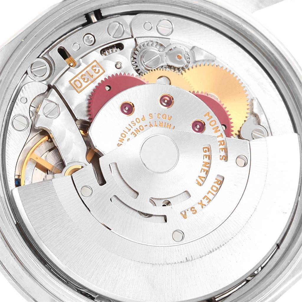 This image shows an angled close-up of the movement mechanism inside a Rolex Air-King 14000 Stainless Steel Black Dial 14000 Stainless Steel Black Dial watch.