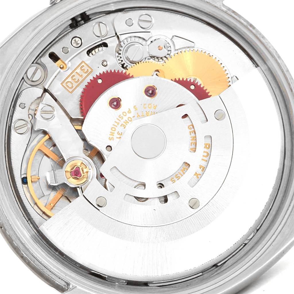 This image shows the internal mechanism of a Rolex Air-King 114234 Men's Stainless Steel Black Dial 114234 Men's Stainless Steel Black Dial watch, highlighting the gears and rotor.