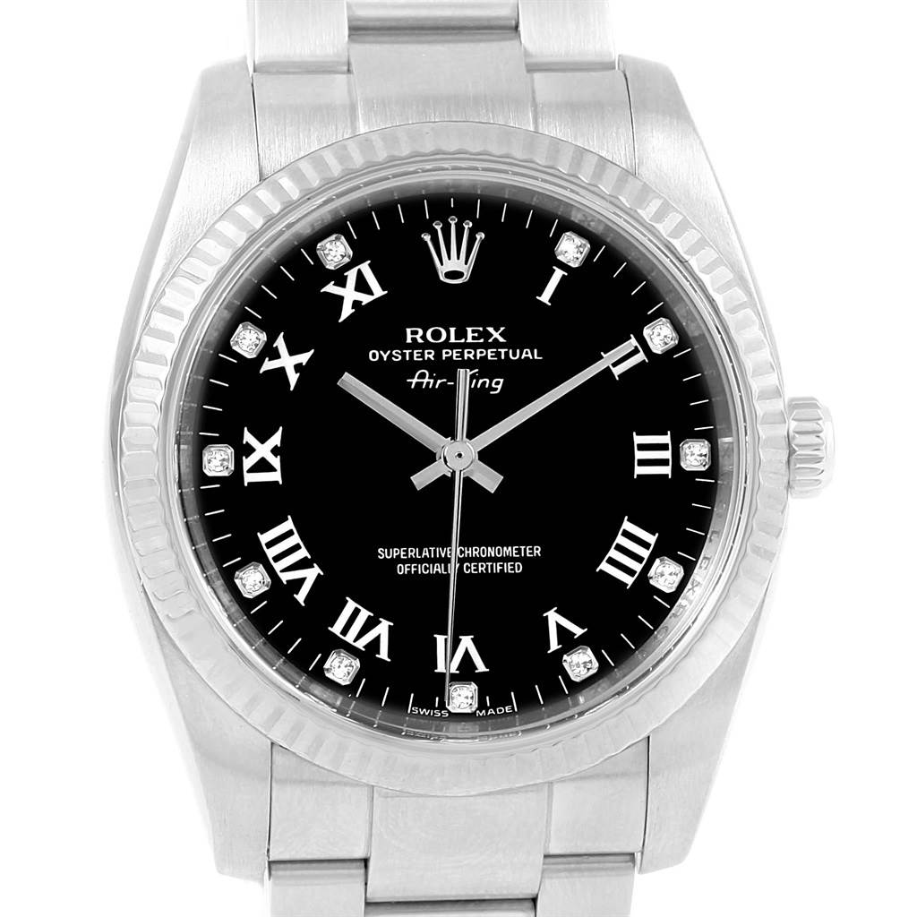 The Rolex Air-King 114234 Men's Stainless Steel Black Dial 114234 Men's Stainless Steel Black Dial watch is shown from a top-down angle, featuring its black dial, Roman numerals, and stainless steel bracelet.
