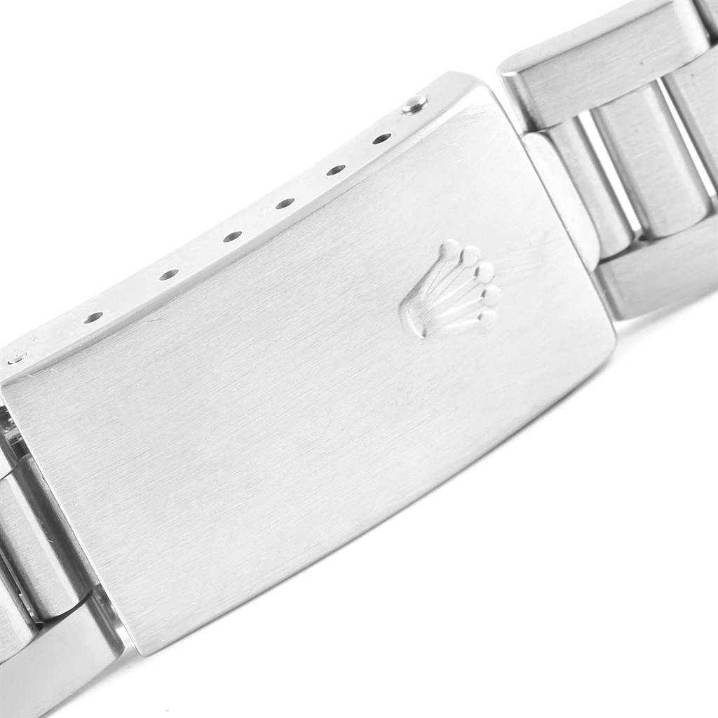 This image shows a close-up of the clasp and bracelet of a Rolex Air-King 14010 Men's Stainless Steel Black Dial 14010 Men's Stainless Steel Black Dial watch.