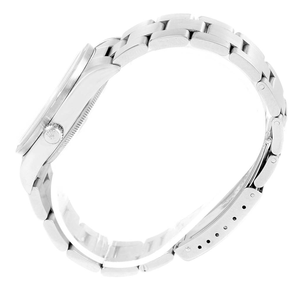 The image shows the side profile of the Rolex Air-King 14010 Men's Stainless Steel Black Dial 14010 Men's Stainless Steel Black Dial watch, highlighting its casing, crown, and bracelet links.