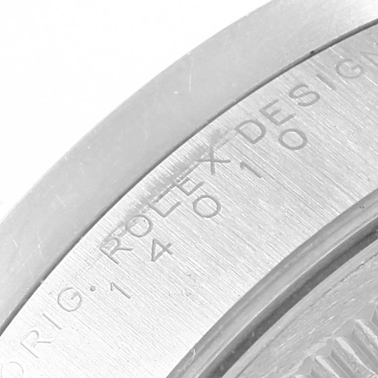 This is a close-up image of the case back edge showing the engravings on a Rolex Air-King 14010 Men's Stainless Steel Black Dial 14010 Men's Stainless Steel Black Dial watch.