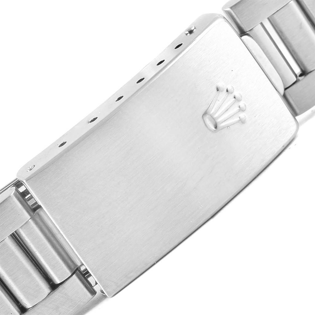 This image shows the clasp and part of the bracelet of a Rolex Air-King 14010 Men's Stainless Steel Black Dial 14010 Men's Stainless Steel Black Dial watch.