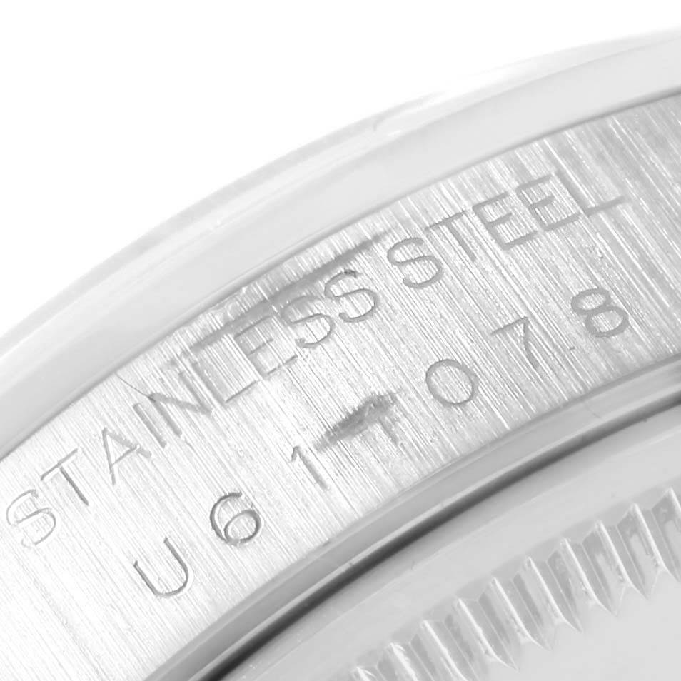 The image shows a close-up of the case back of the Rolex Air-King 14000 Men's Stainless Steel Blue Dial 14000 Men's Stainless Steel Blue Dial, highlighting its stainless steel inscription and serial number.