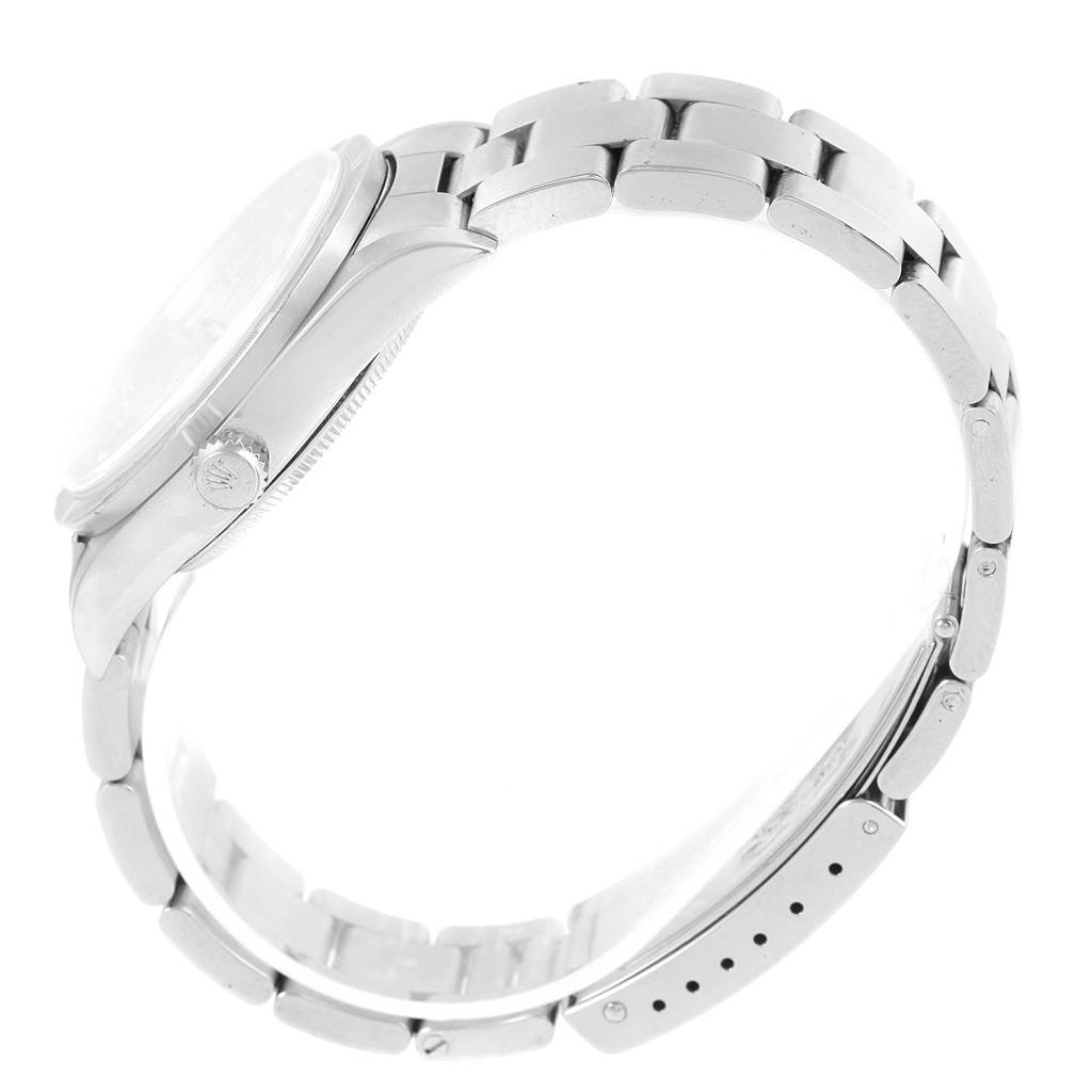 The Rolex Air-King 14010 Men's Stainless Steel Silver Dial 14010 Men's Stainless Steel Silver Dial watch is shown from a side angle, displaying the crown, case, and bracelet.