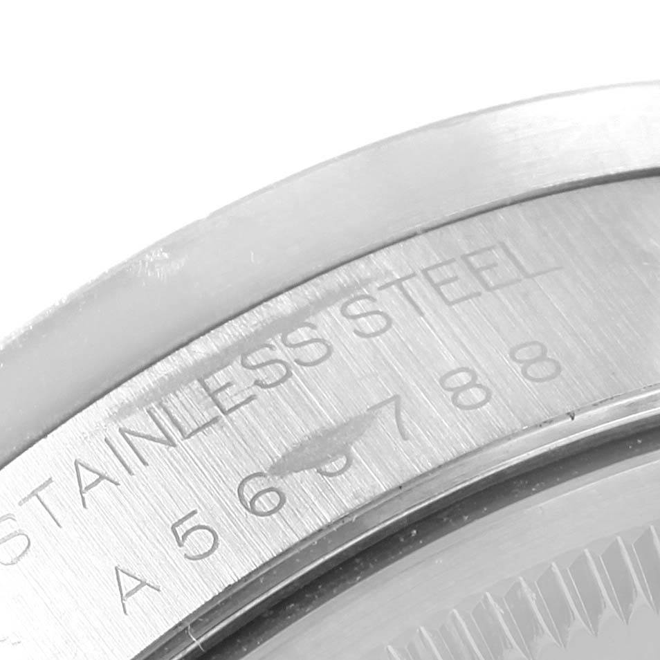 This image shows a close-up of the side and back of a Rolex Air-King 14010 Men's Stainless Steel Silver Dial 14010 Men's Stainless Steel Silver Dial watch, focusing on the stainless steel engraving and model number.