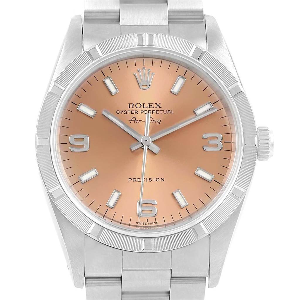 This is a front view of the Rolex Air-King 14010 Stainless Steel Pink Dial 14010 Stainless Steel Pink Dial watch showing the dial, hands, indices, bezel, case, and part of the bracelet.