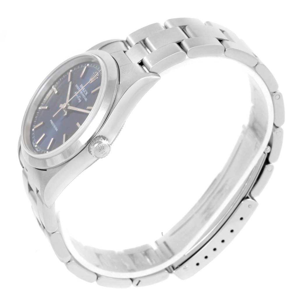 The image shows a side view of the Rolex Air-King 14000 Men's Stainless Steel Blue Dial 14000 Men's Stainless Steel Blue Dial watch, highlighting its bezel, crown, and stainless steel bracelet.