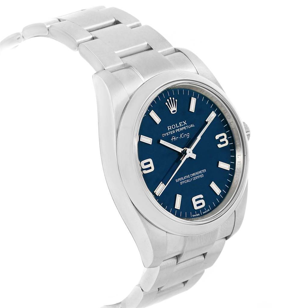 The image shows a side angle of the Rolex Air-King 114200 Men's Stainless Steel Blue Dial 114200 Men's Stainless Steel Blue Dial watch, featuring the face, case, and part of the bracelet.