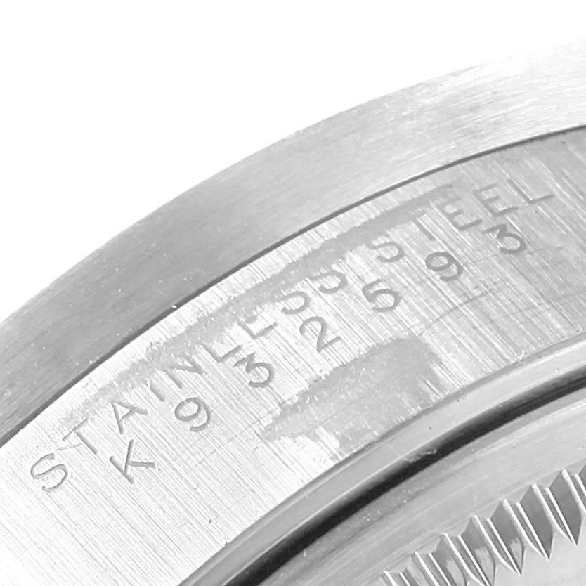This image shows a close-up of the stainless steel case back of a Rolex Air-King 14010 Men's Stainless Steel Black Dial 14010 Men's Stainless Steel Black Dial watch, focusing on its engraved markings.