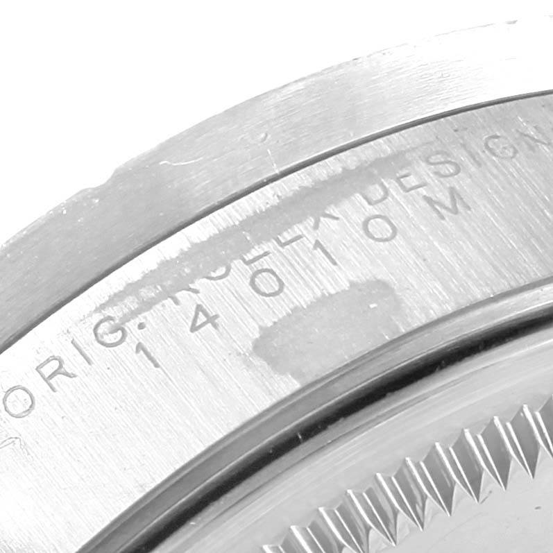 The image shows a close-up angle focusing on the engraved caseback of a Rolex Air-King 14010 Men's Stainless Steel Black Dial 14010 Men's Stainless Steel Black Dial model wristwatch.