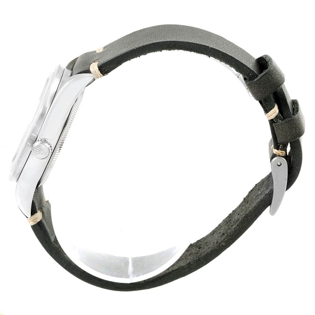 The image shows a side view of the Rolex Air-King 14010 Men's Stainless Steel Black Dial 14010 Men's Stainless Steel Black Dial watch, featuring its case, crown, and leather strap.