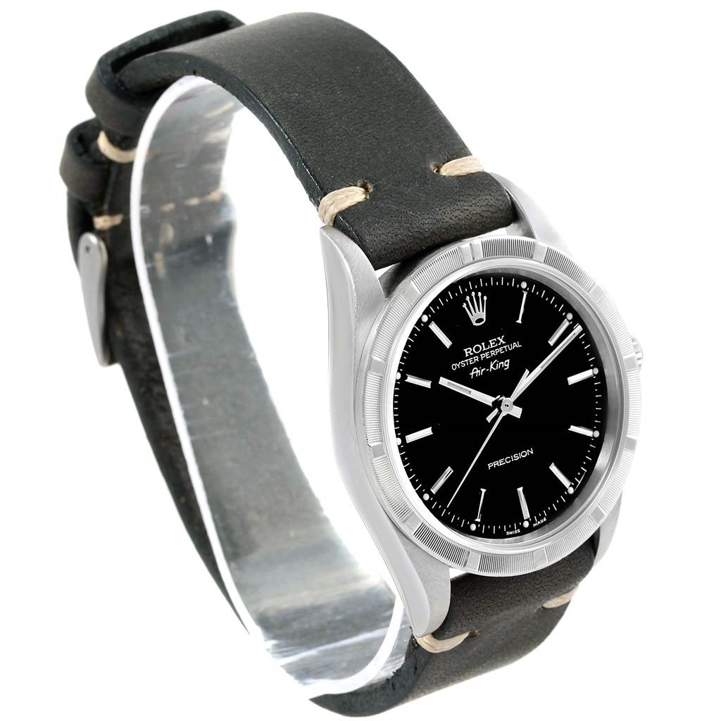 The Rolex Air-King 14010 Men's Stainless Steel Black Dial 14010 Men's Stainless Steel Black Dial watch is shown at a slight angle, showcasing the black dial, hour markers, and leather strap.