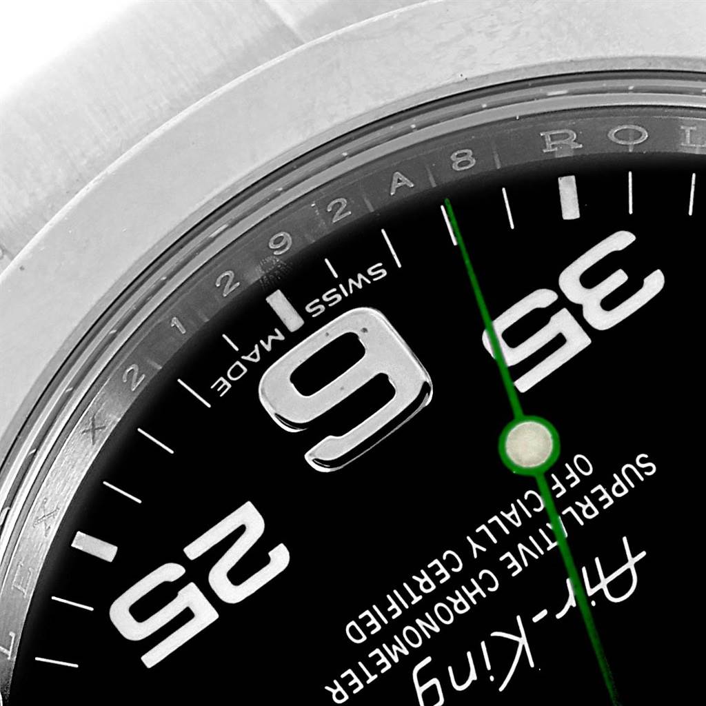 Close-up of the dial and bezel of the Rolex Air-King 116900 Men's Stainless Steel Black Dial 116900 Men's Stainless Steel Black Dial, showing the 9, 3, and 6 markers, the words "Swiss Made," and partial branding.