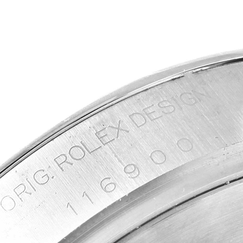 The image shows a close-up of the back part of a Rolex Air-King 116900 Men's Stainless Steel Black Dial 116900 Men's Stainless Steel Black Dial watch, highlighting the engraved model and design information.