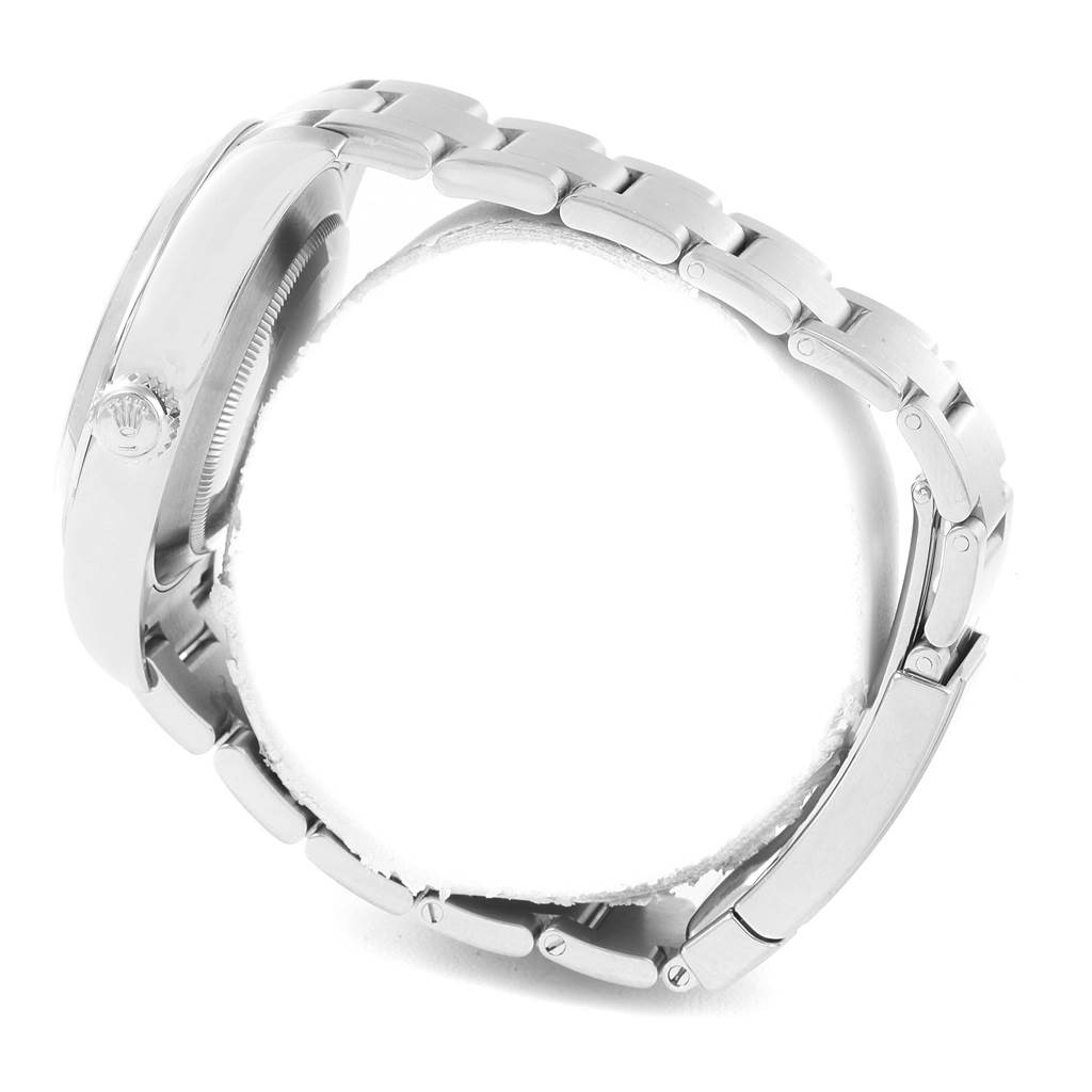 The image shows a side angle of the Rolex Air-King 116900 Men's Stainless Steel Black Dial 116900 Men's Stainless Steel Black Dial watch, focusing on the bracelet and the case with the crown.