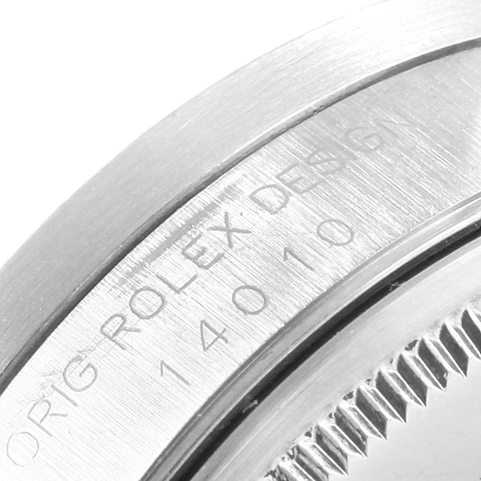 The image shows a close-up of the engraving on the side of a Rolex Air-King 14010 Men's Stainless Steel White Dial 14010 Men's Stainless Steel White Dial watch case, highlighting the model number 14010.