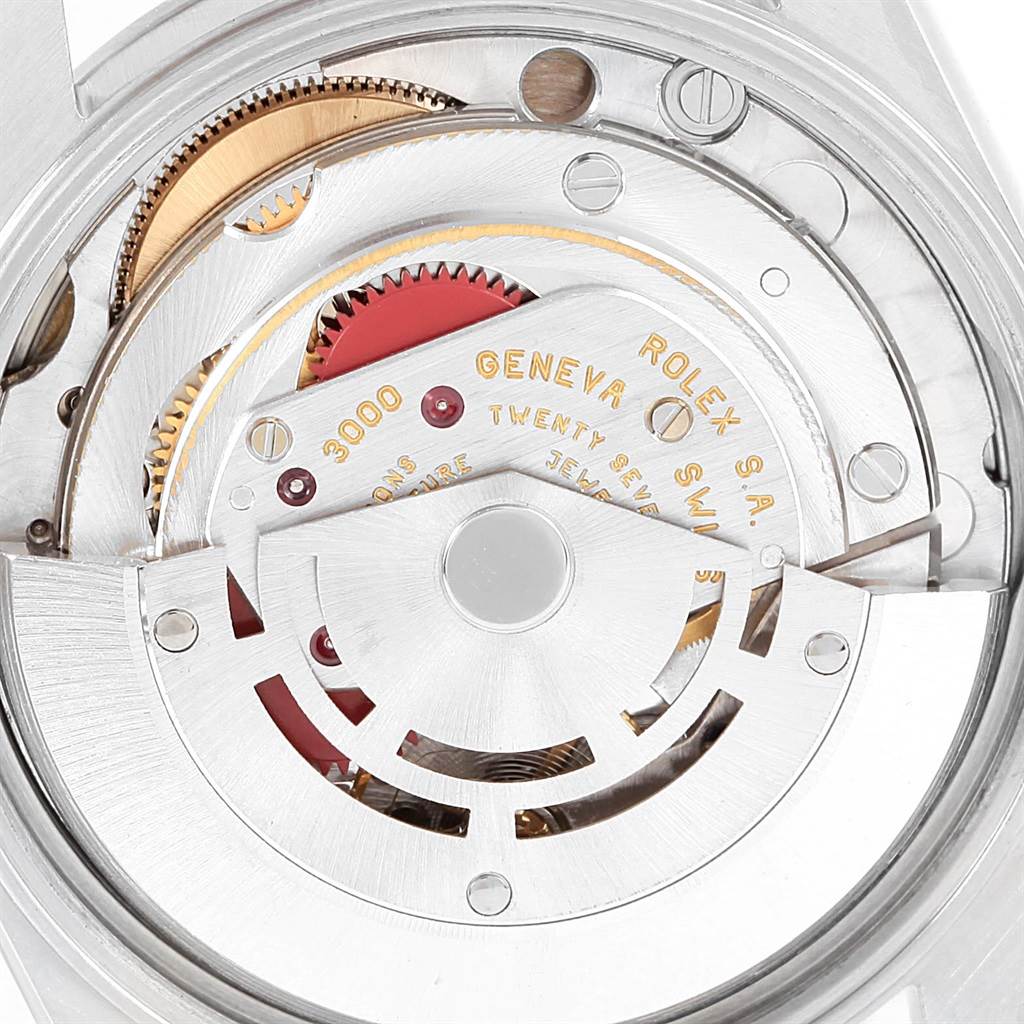 This image shows the intricate internal movement of the Rolex Air-King 14000 Men's Stainless Steel Silver Dial 14000 Men's Stainless Steel Silver Dial watch, focusing on its gears and mechanical components.