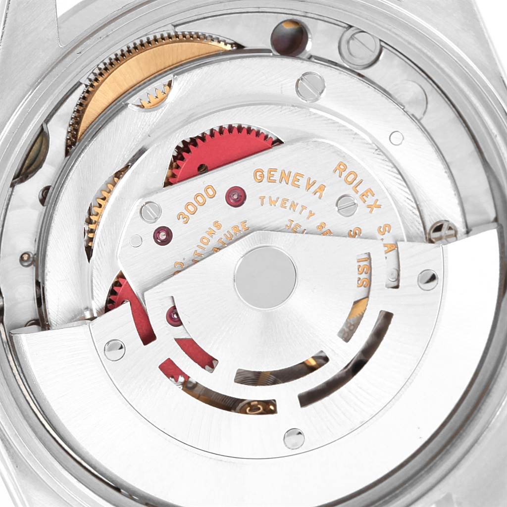 The image shows an up-close view of the movement mechanism of a Rolex Air-King 14000 Men's Stainless Steel Blue Dial 14000 Men's Stainless Steel Blue Dial watch, focusing on its intricate internal components.