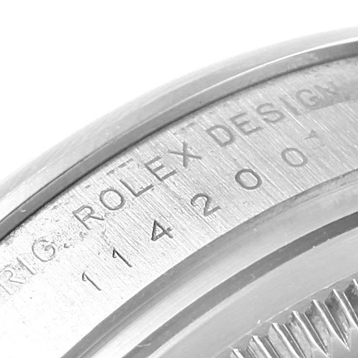 The image shows a close-up of the case back edge of a Rolex Air-King 114200 Men's Stainless Steel Blue Dial 114200 Men's Stainless Steel Blue Dial watch, displaying the model number 114200.